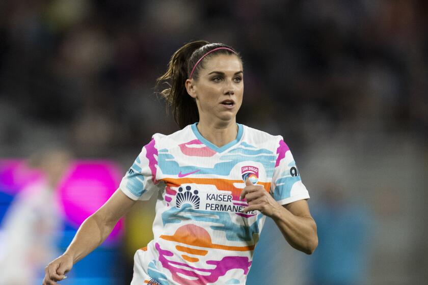 San Diego Wave forward Alex Morgan (13) runs during an NWSL soccer match against Seattle Reign, Friday, March 29, 2024, in San Diego. (AP Photo/Kyusung Gong)