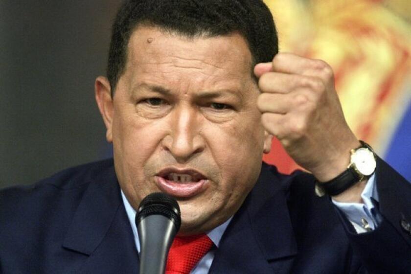 President Hugo Chavez speaks at a news conference Dec. 5, 2006, in Caracas, Venezuela.