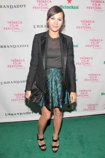 "Monogamy" star Rashida Jones poses on the after party's green carpet.