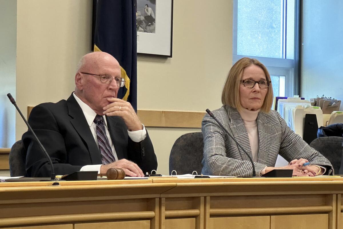 Daniel Wathen and Paula Silsby, of an independent commission studying the mass shootings last month in Lewiston, Maine, hold the commission's first meeting, Monday, Nov. 20, 2023, in Augusta, Maine. (AP Photo/Patrick Whittle)