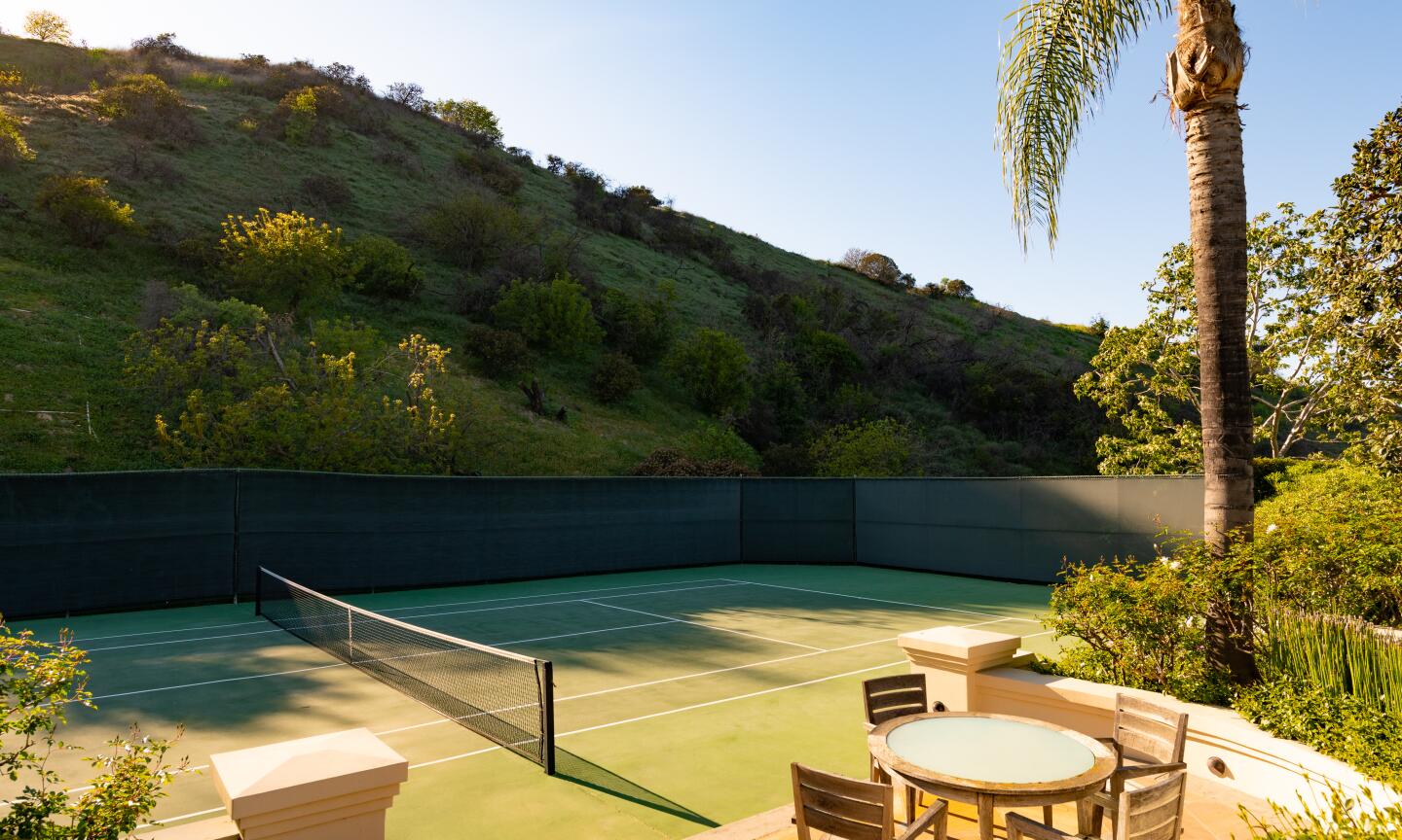The tennis court.