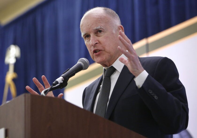 Gov. Jerry Brown is seeking funds from the Legislature to help move more inmates out of California's prisons, while asking the U.S. Supreme Court to throw out his plan.