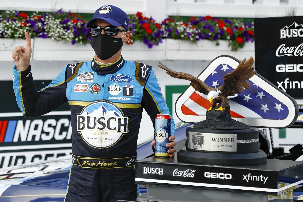 Kevin Harvick celebrates after winning the NASCAR Cup Series race at Pocono Raceway on June 27, 2020, in Long Pond, Pa.