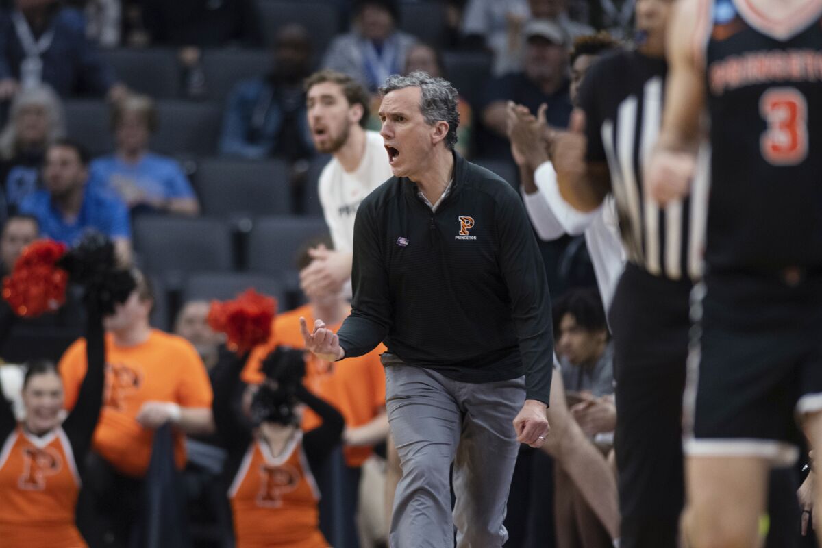 Princeton coach Mitch Henderson instructs players against Missouri on March 18, 2023.
