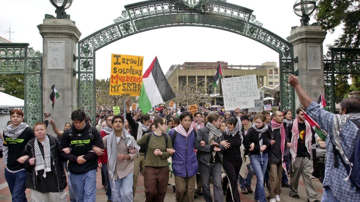 Pro-Palestinian demonstrators march through Sather Gate on the University of California, Berkeley campus in 2002.