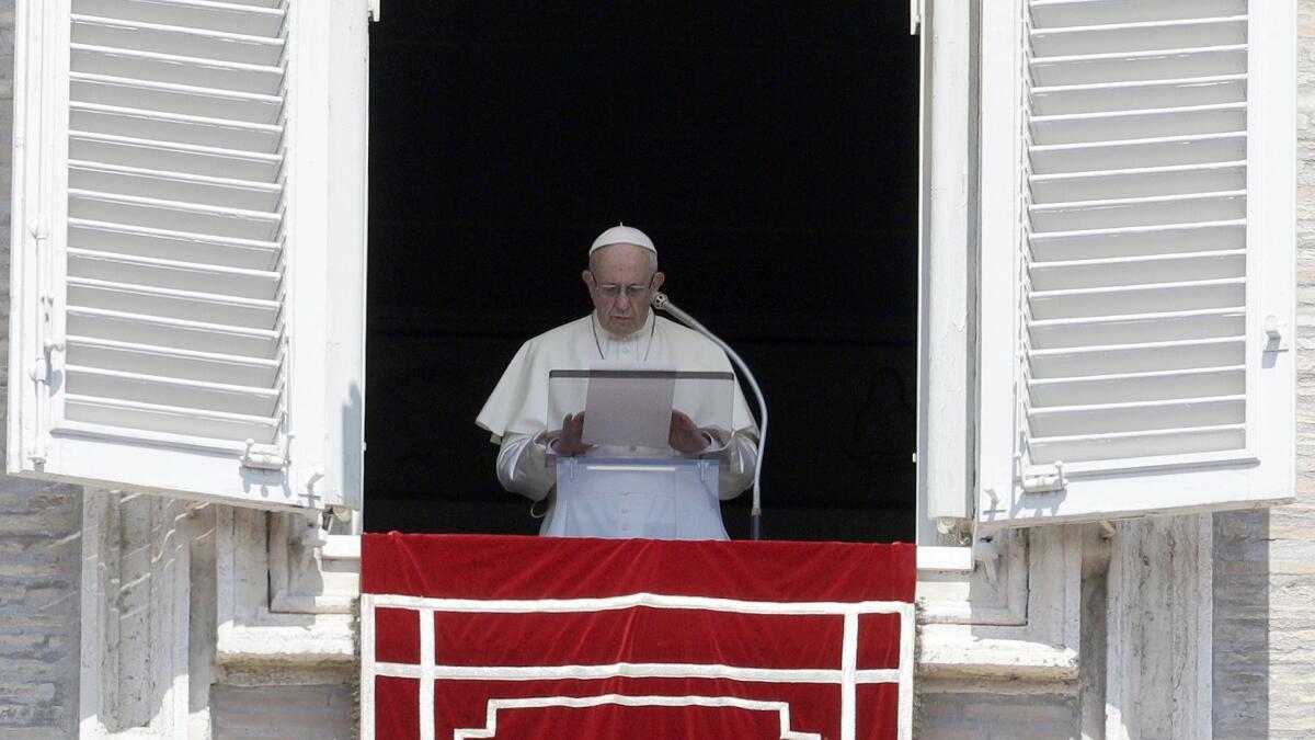 Pope Francis during the Angelus noon prayer in St.Peter's Square, at the Vatican on Sunday.