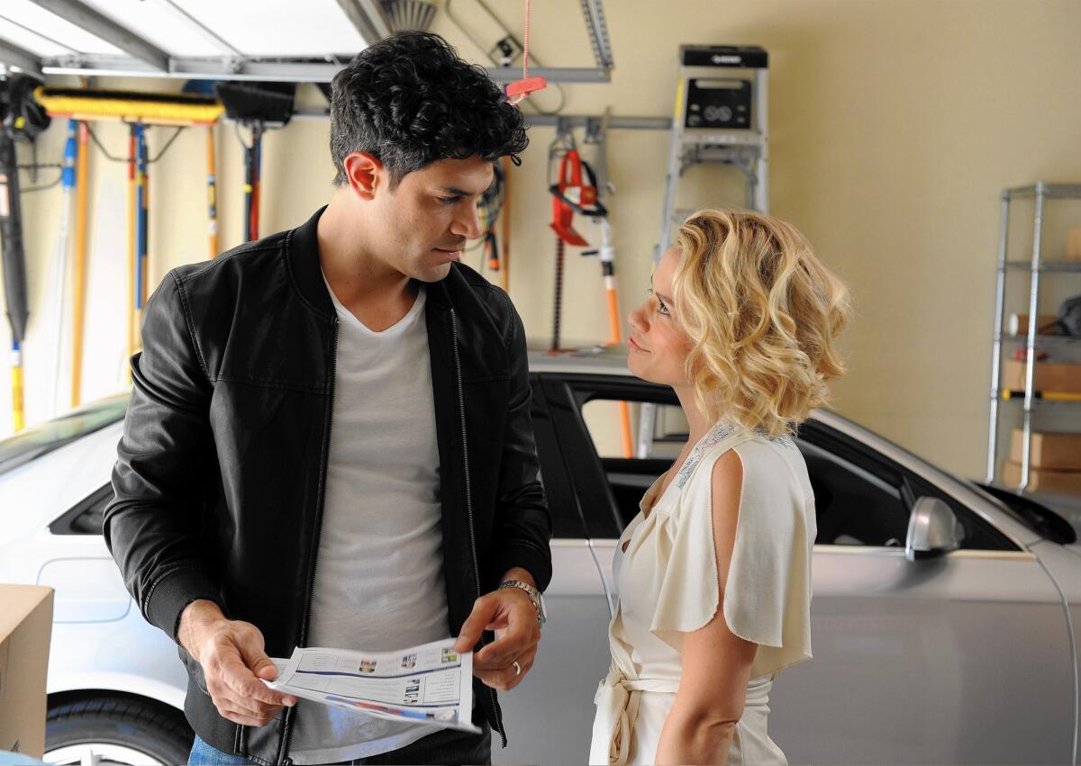 Bethany Joy Lenz, here with Damon Dayoub, was pushed out of her role as Zoe on Shonda Rhimes' "The Catch."