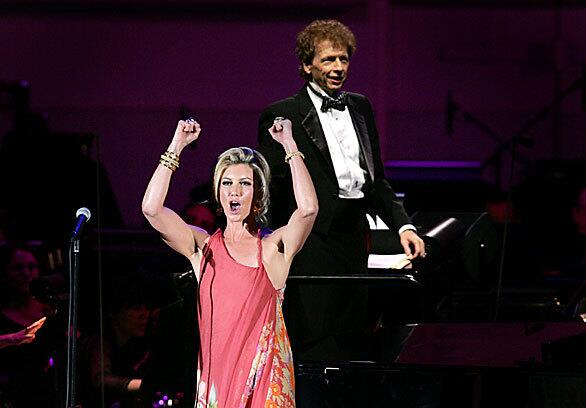Faith Hill performs in concert with the Hollywood Bowl Orchestra, conducted by David Campbell, background.