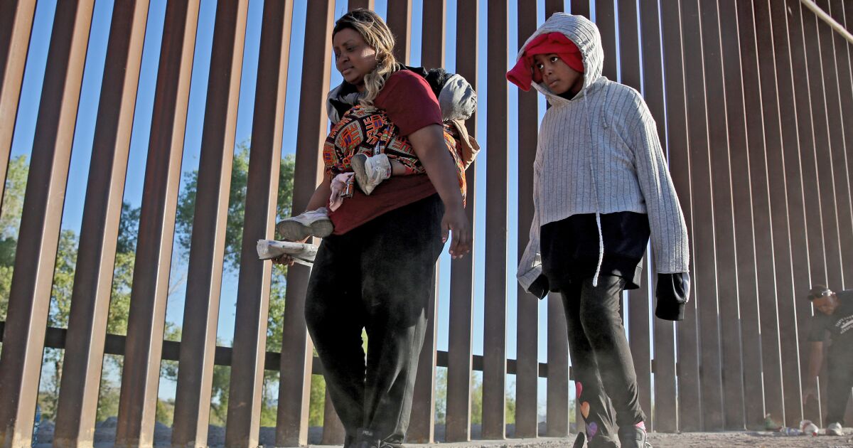 Fleeing bloodshed, poverty and despair, immigrant asylum seekers line up in the desert Fleeing bloodshed, poverty and despair, immigrant asylum seekers line up in the desert