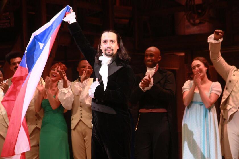SAN JUAN, PUERTO RICO - JANUARY 11: Lin- Manuel Miranda with the cast of Hamilton speaks to the audience at the end of the play as part of the opening night at Centro de Bellas Artes on January 11, 2019 in San Juan, Puerto Rico. (Photo by Gladys Vega/Getty Images for "Hamilton")