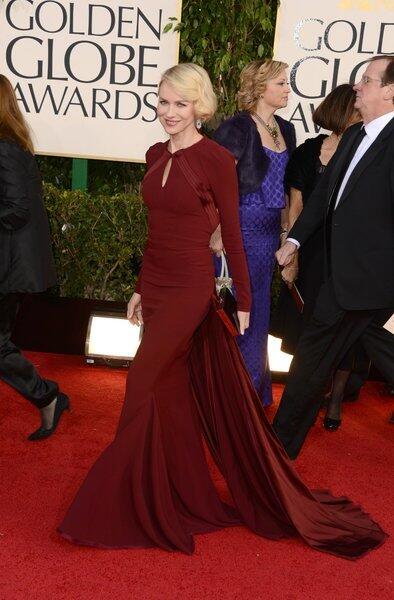 Naomi Watts' long-sleeved, backless cranberry gown by Zac Posen was covered up but sexy.