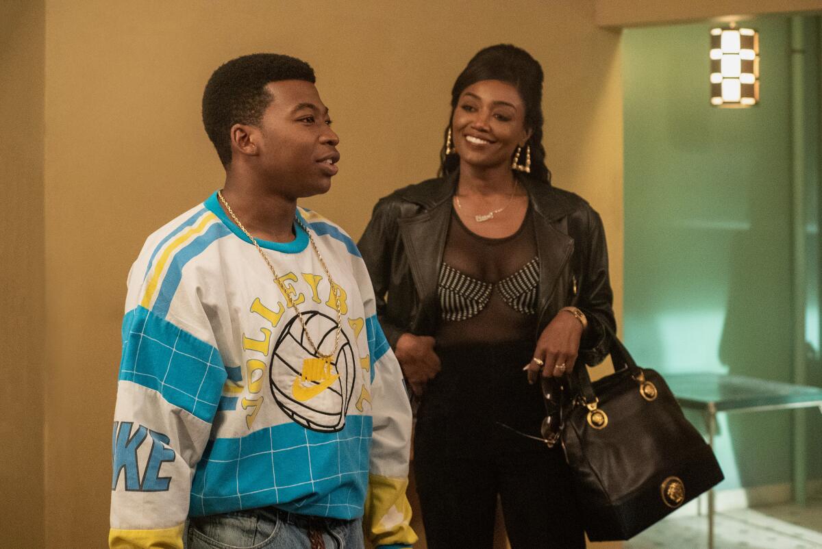 Mekai Curtis as Kanan and Patina Miller as Raq in "Raising Kanan."