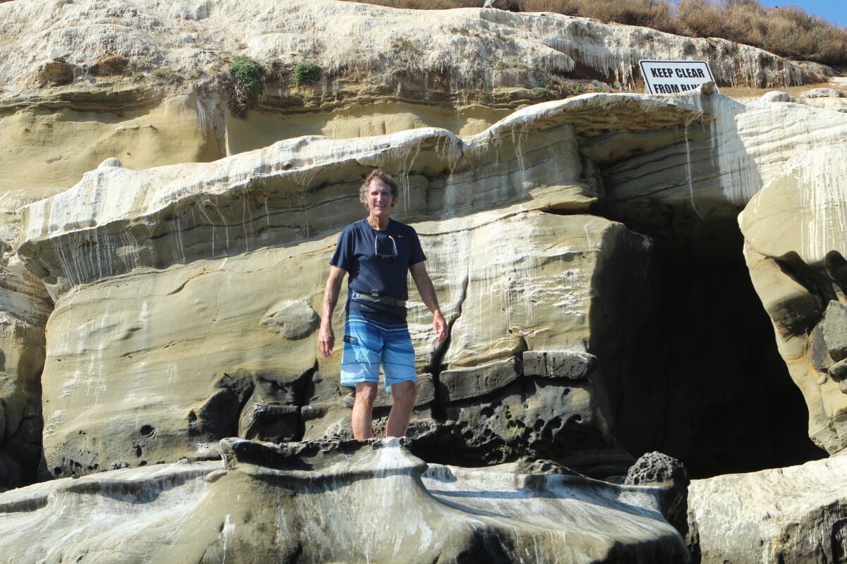 Koch climbs up the cliffs he descended 42 years ago.