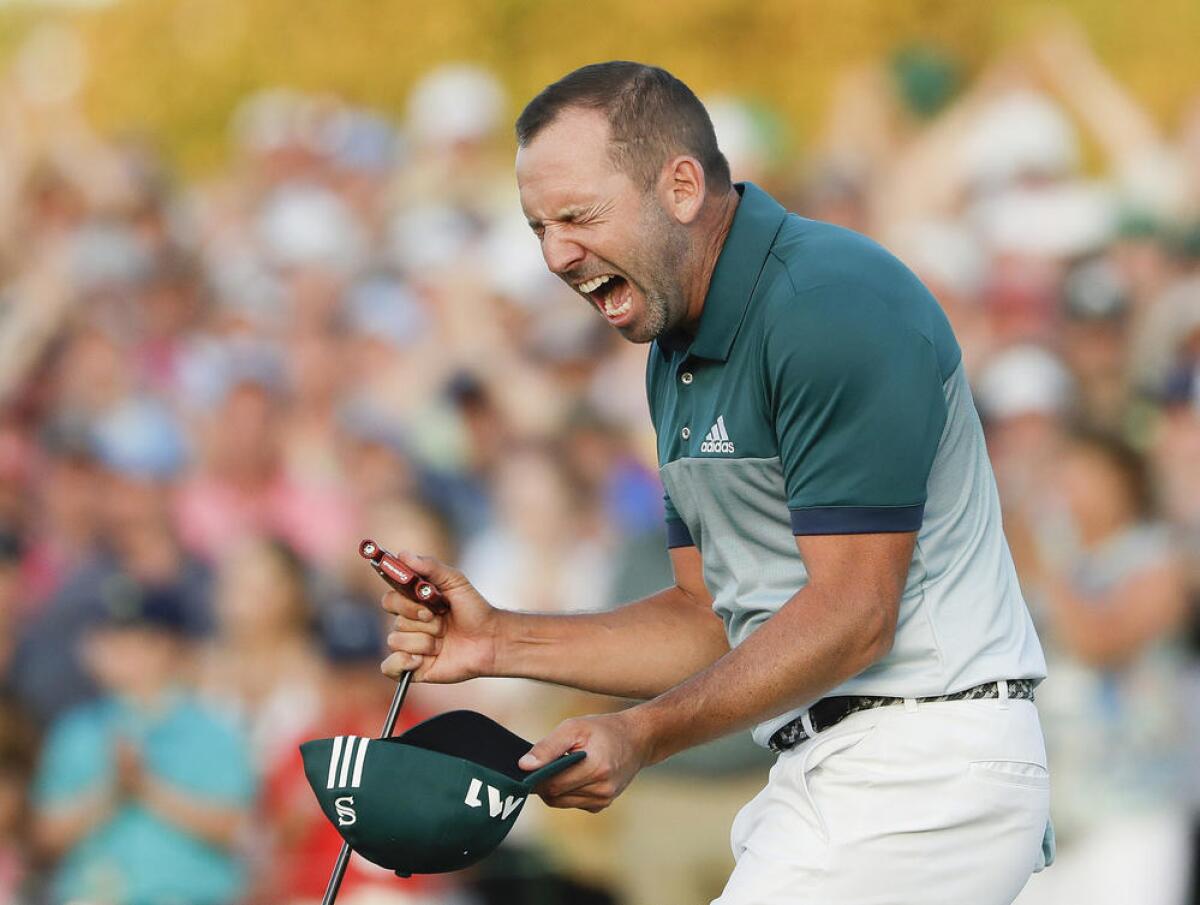 Garcia after making the winning putt.