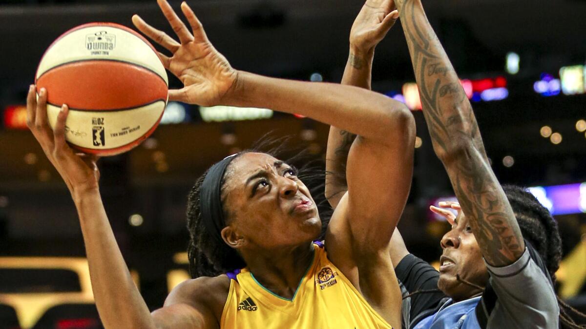 Sparks forward Nneka Ogwumike tries to score inside against Sky forward Jessica Breland during Game 2.