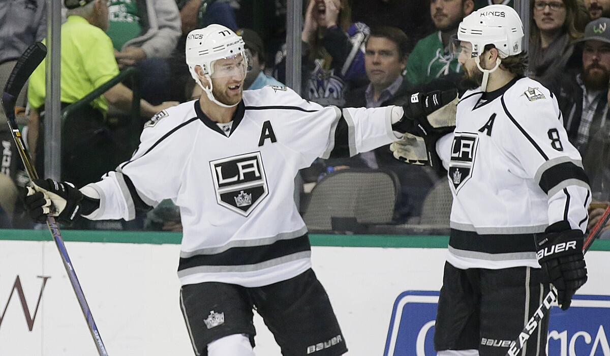 Kings center Jeff Carter, left, celebrates with teammate Drew Doughty after scoring a goal against Dallas on Dec. 23.