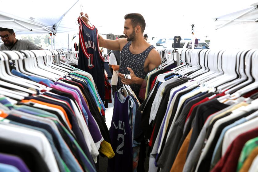 PASADENA-CA-AUGUST 11, 2019: Souren Ohanian shops the Rose Bowl Flea Market on Sunday, August 11, 2019. (Christina House / Los Angeles Times)