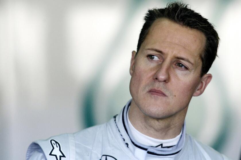 Michael Schumacher looks on during a practice session with Mercedes in Spain in February 2010.