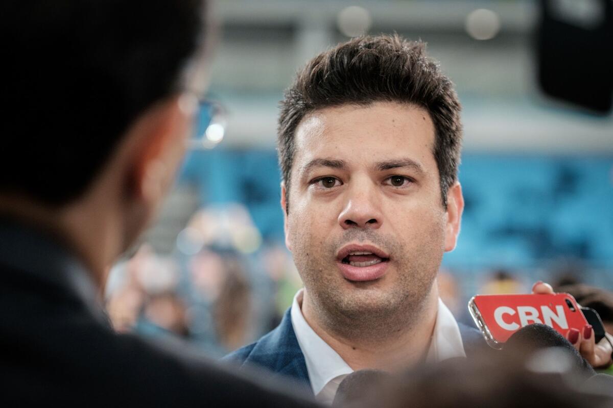 Brazilian Sports Minister Leonardo Picciani speaks to the media on May 14.