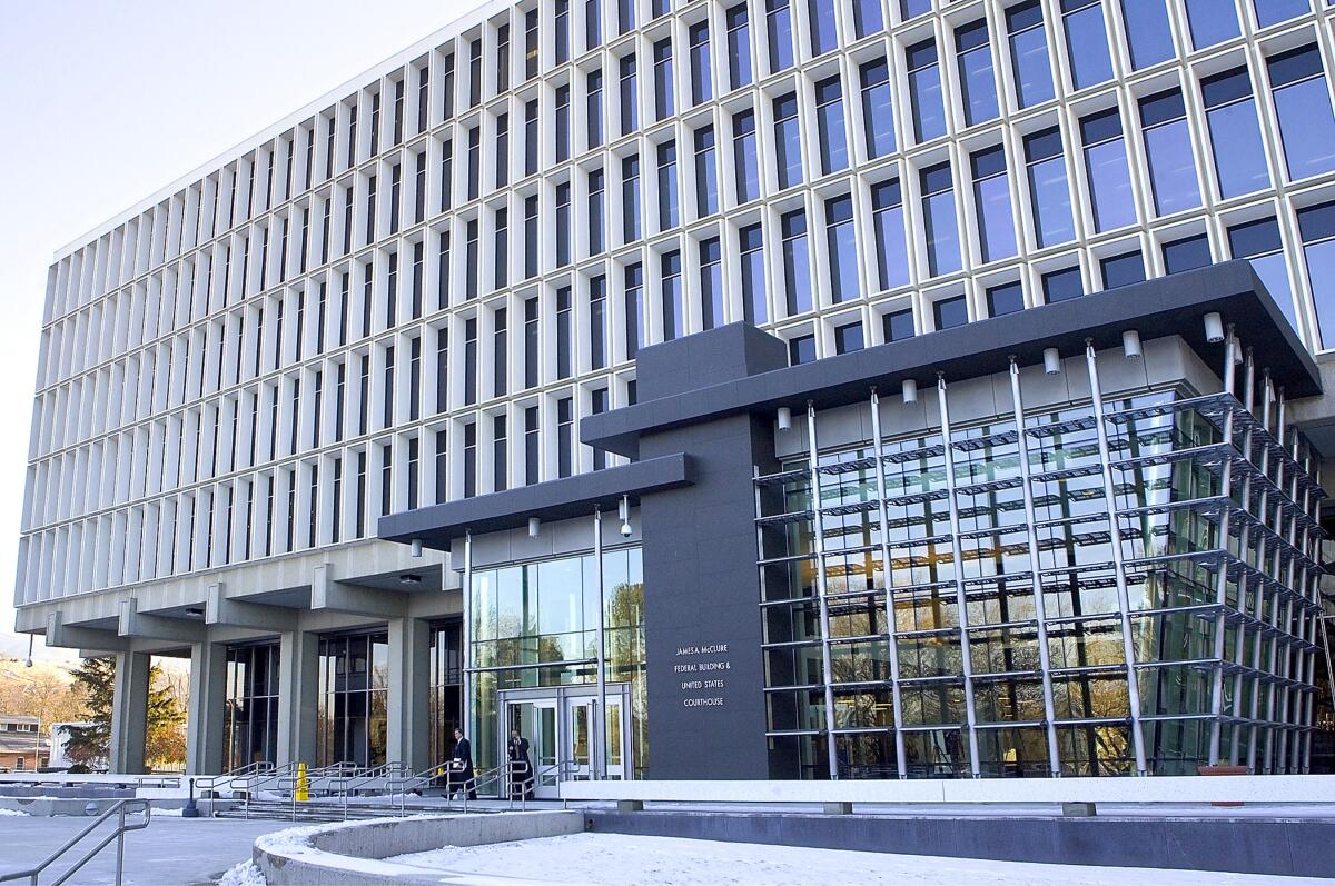 FILE - The James A. McClure Federal Building & United States Courthouse, which houses the U.S. District Court, in seen in Boise, Idaho, on Jan. 19, 2007. Idaho has agreed to allow people who have been convicted of having oral or anal sex under an antiquated law to be removed from the state's sex offender list in order to settle a two-year-old lawsuit. The Idaho State Police will also pay the attorneys fees of the men who sued over the law, according to the settlement filed in Idaho's U.S. District Court on Thursday, Nov. 10, 2022. (AP Photo/Troy Maben, File)