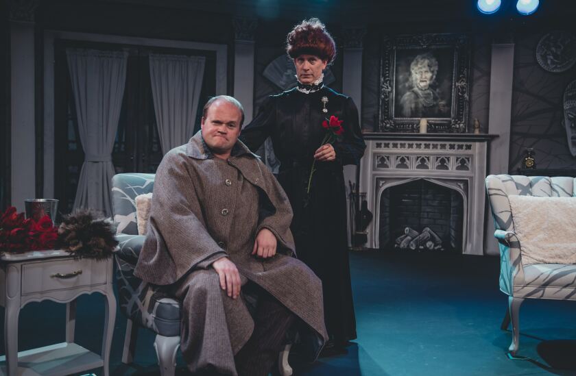 Isaac Wade, sitting, and John Allee in “The Mystery of Irma Vep” at Actors Co-op.