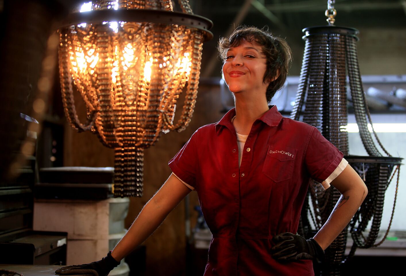 Artist Carolina Fontoura Alzaga makes chandeliers from old bicycle parts, including chains, sprockets and spoked wheels. Her company, Facaro, ships the custom-made light fixtures all over the world.