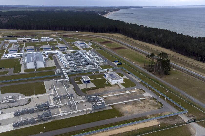 The landfall facilities of the 'Nord Stream 2' gas pipline are pictured in Lubmin, northern Germany, Tuesday, Feb. 15, 2022. Nord Stream 2 is a 1,230-kilometer-long (764-mile-long) natural gas pipeline under the Baltic Sea, running from Russia to Germany's Baltic coast. (AP Photo/Michael Sohn)