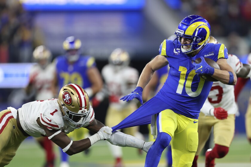 San Francisco 49ers free safety Jimmie Ward (1) tries to tackle Los Angeles Rams wide receiver Cooper Kupp (10) during the second half of the NFC Championship NFL football game Sunday, Jan. 30, 2022, in Inglewood, Calif. (AP Photo/Jed Jacobsohn)