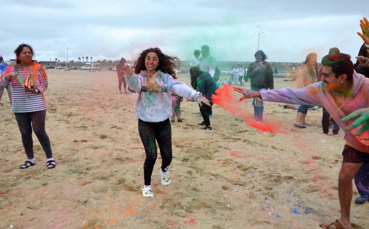 Chandni Sheth dances during "Holi by the Sea" at Bolsa Chica State Beach.