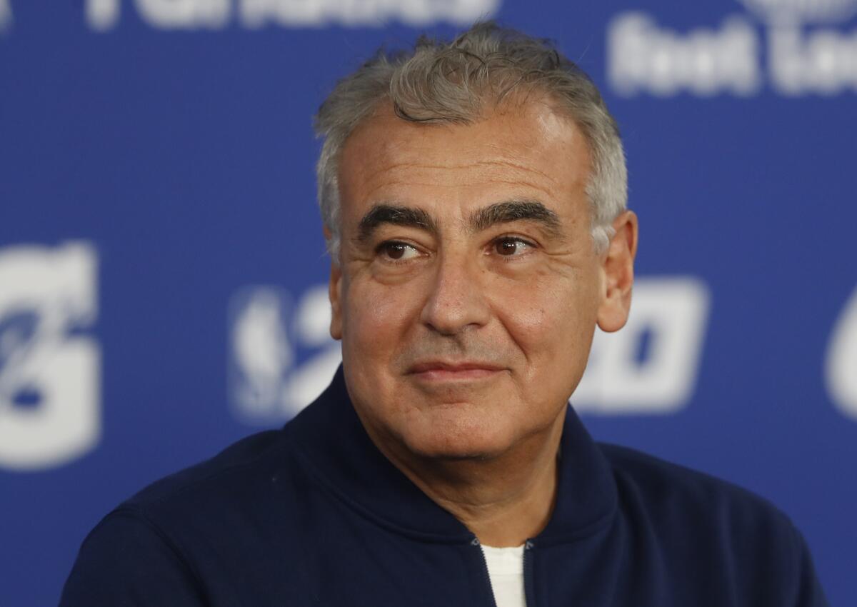 FILE - In this Jan. 24, 2020, file photo, Marc Lasry, co-owner of the NBA's Milwaukee Bucks attends a press conference ahead of NBA basketball game between Charlotte Hornets and Milwaukee Bucks in Paris. Lasry, the hedge-fund billionaire and Milwaukee Bucks co-owner who was named chairman of embattled media organization Ozy earlier this month, has resigned from its board. (AP Photo/Thibault Camus, File)
