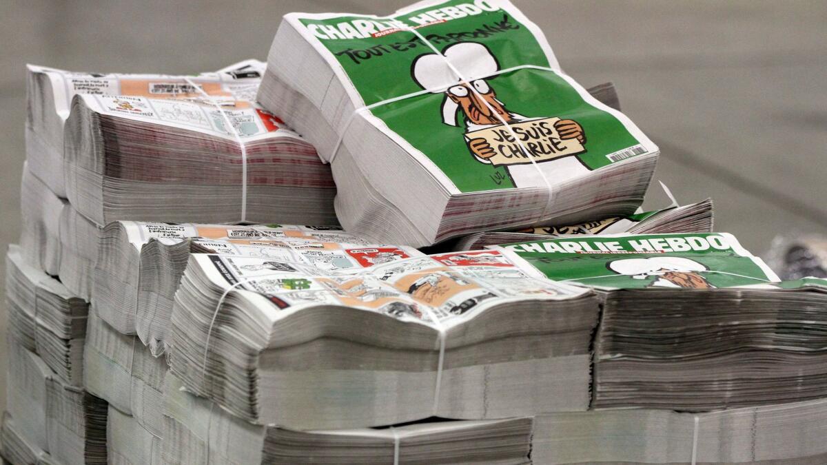 Copies of the French satirical magazine Charlie Hebdo are stacked at a distribution center in Nantes, France, Jan. 13, 2015. (Eddy Lemaistre / European Press Agency)