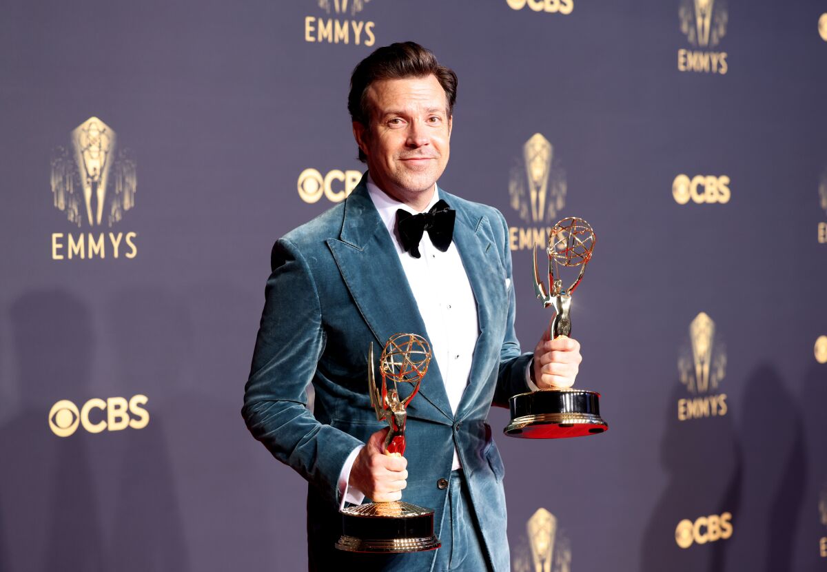 Jason Sudeikis of "Ted Lasso" poses with his Emmy Awards
