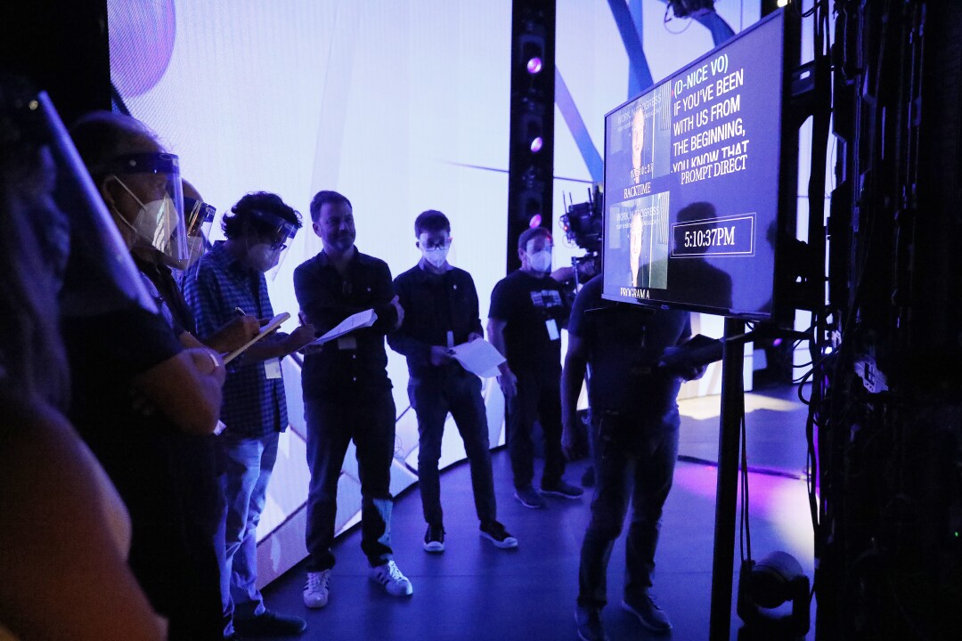 Host Jimmy Kimmel, center, works with his writers backstage during rehearsals at Staples Center.