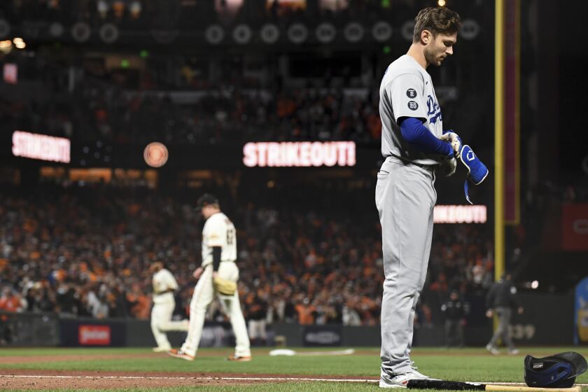 San Francisco, CA - October 08: Los Angeles Dodgers' Trea Turner walks off the field after striking out to end the top of the sixth inning against the San Francisco Giants at Oracle Park on Friday, Oct. 8, 2021 in San Francisco, CA. (Wally Skalij / Los Angeles Times)
