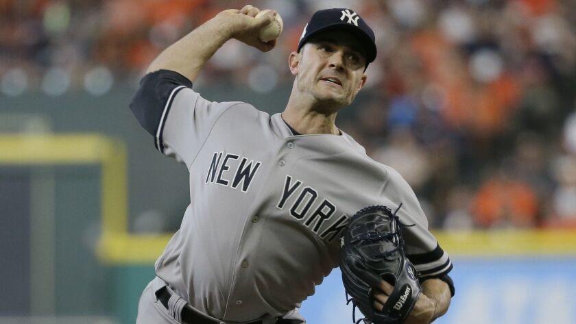 Pitcher David Robertson throws during the seventh inning of Game 2 of baseball's American League Championship Series against the Houston Astros in Houston.