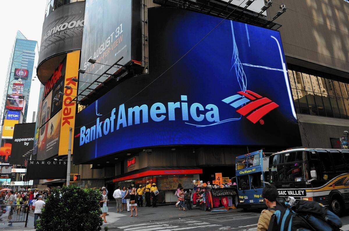 Bank of America Corp. said it earned $11.4 billion in 2013, up sharply from $4.2 billion the previous year. Above, the bank's Times Square branch in New York.
