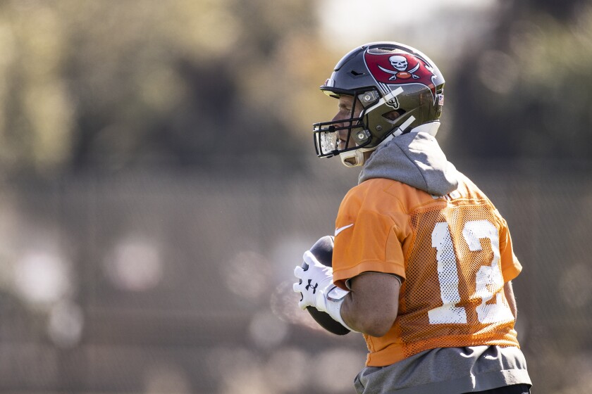 Tampa Bay Buccaneers quarterback Tom Brady during NFL football practice, Thursday, Feb. 4, 2021 in Tampa, Fla. The Buccaneers will face the Kansas City Chiefs in Super Bowl 55. (Kyle Zedaker/Tampa Bay Buccaneers via AP)