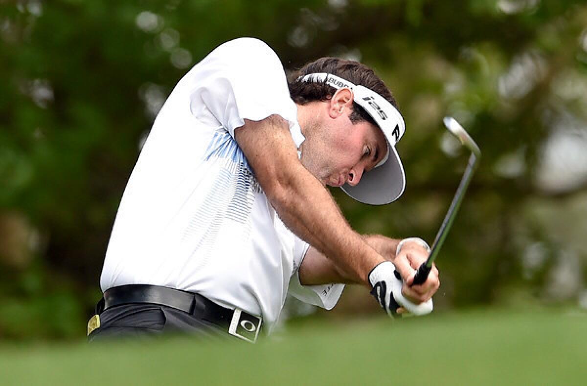 Bubba Watson tees off on the fourth hole during the final round of the Masters on Sunday at Augusta National Golf Club.