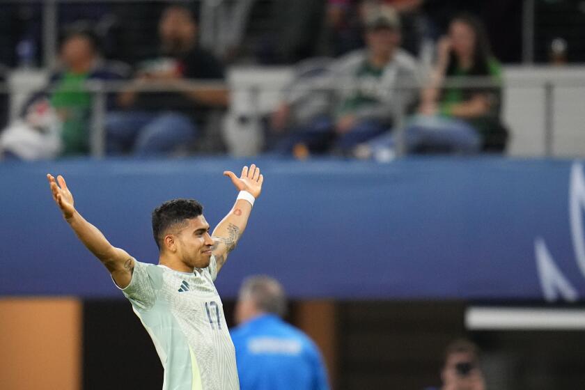 Mexico's Orbelin Pineda celebrates his second half goal against Panama during a CONCACAF Nations League semifinals soccer match, Thursday, March 21, 2024, in Arlington, Texas. (AP Photo/Julio Cortez)