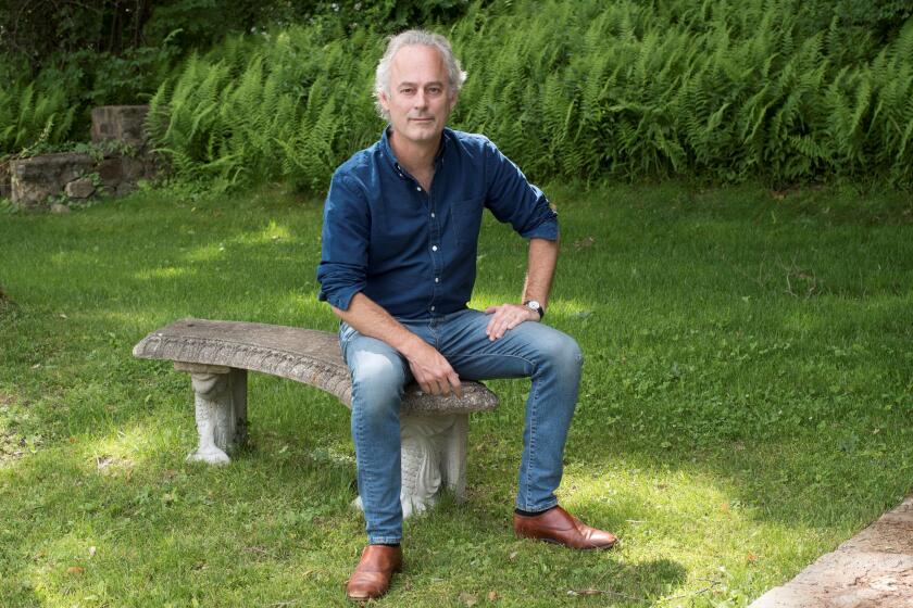 Man seated outdoors