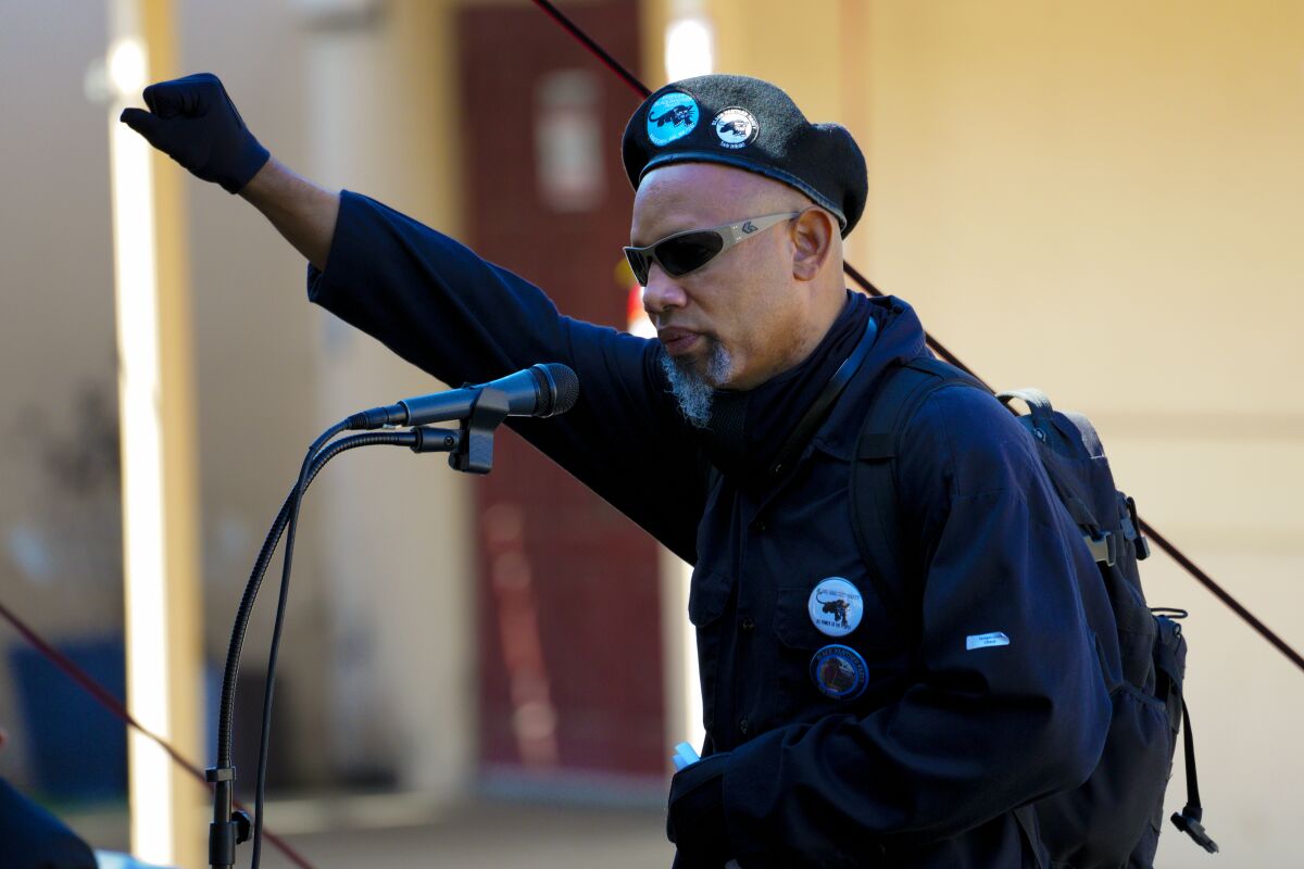 Robert War Williams, chairman for the Black Panther Party of San Diego, gives raised fist salute