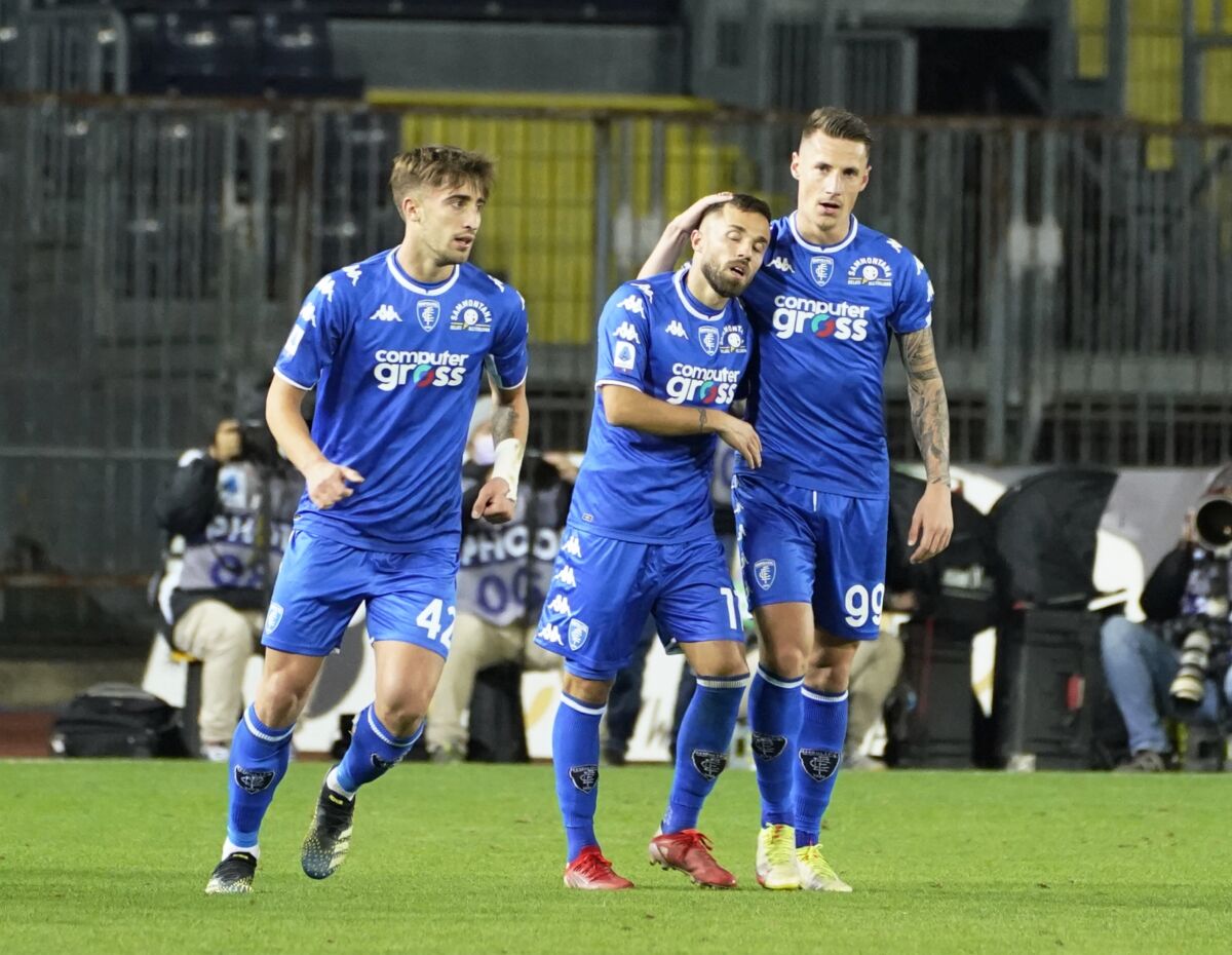 Empoli players celebrate a goal during the Serie A soccer match between Empoli and Genoa, at the Carlo Castellani stadium in Empoli, Italy, Friday, Nov. 5, 2021. (Marco Bucco/LaPresse via AP)