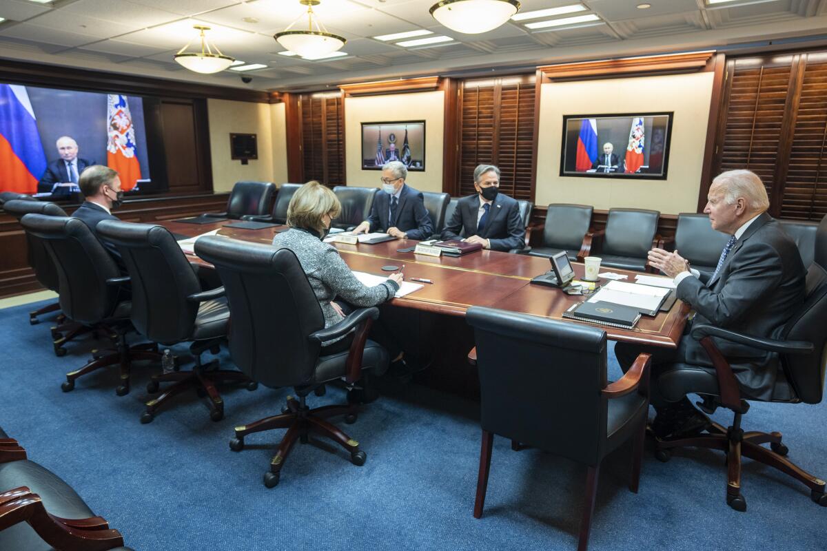 President Joe Biden meets via video conference with Russian President Vladimir Putin.