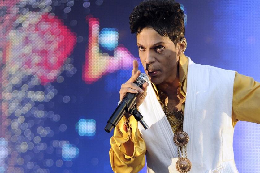 Prince performs at the Stade de France in Saint-Denis, outside Paris, in June 2011.