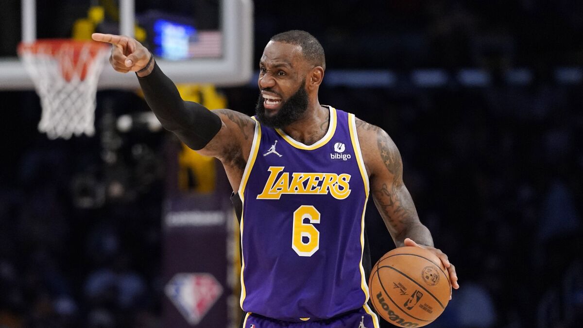 Lakers forward LeBron James gestures during a game against the Utah Jazz on Feb. 16.