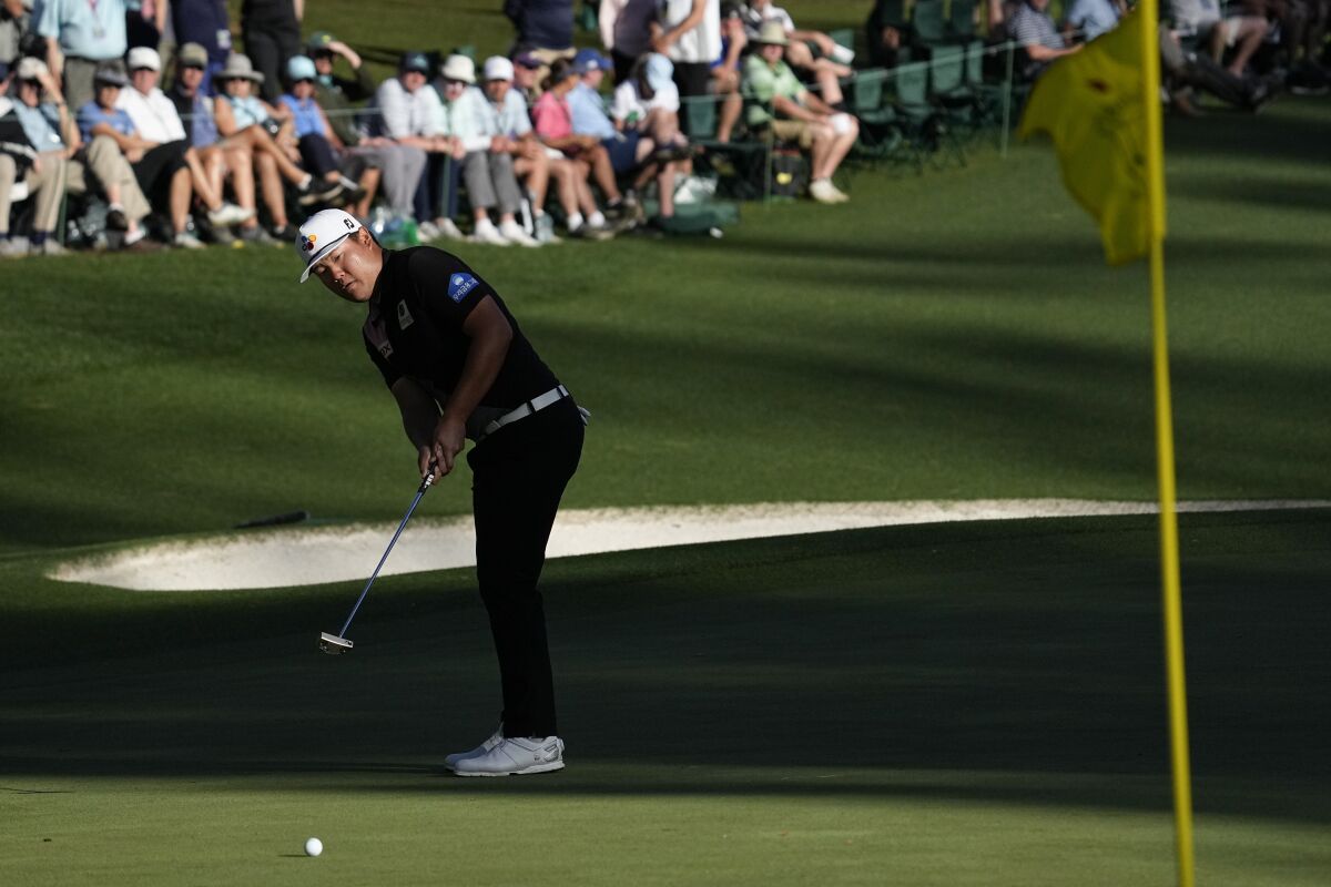 Sungjae Im putts on the 16th green during the first round at the Masters on Thursday.