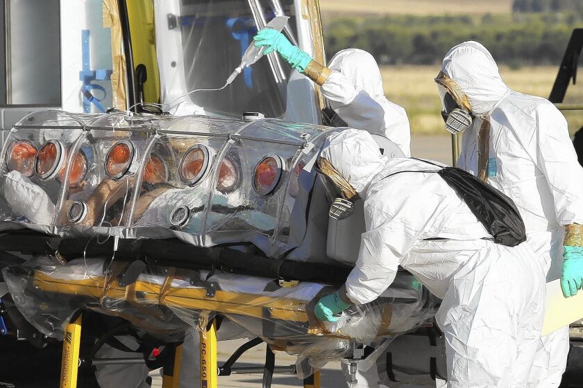 A Spanish priest who was infected with the Ebola virus while working in Liberia arrives in Spain for treatment.