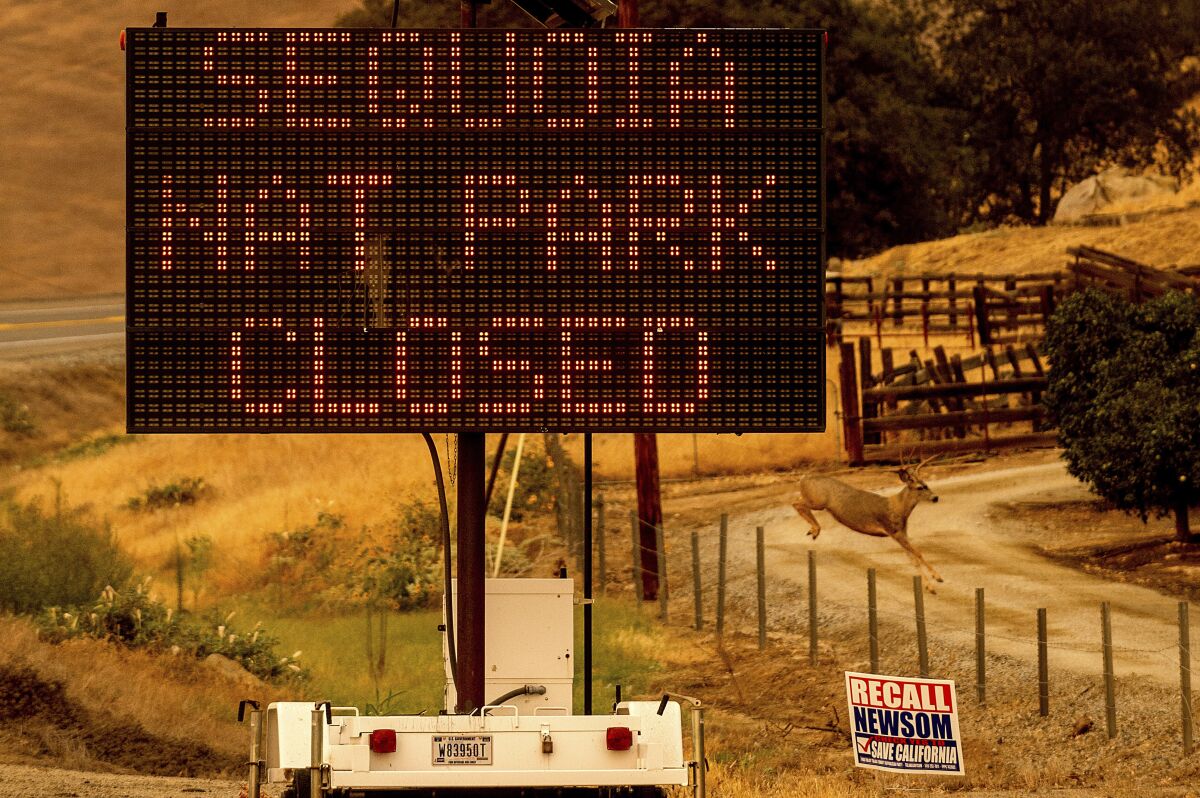 A sign announces the closure of Sequoia National Park on Tuesday