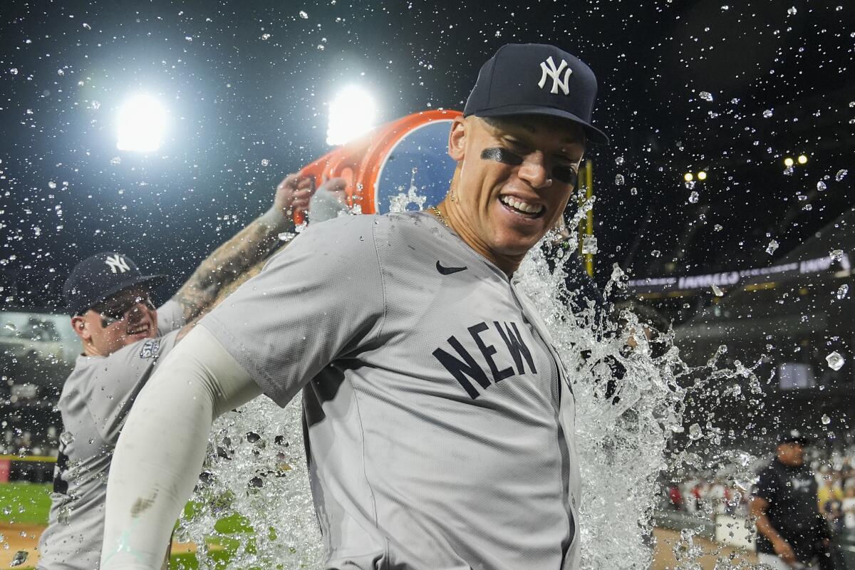 The Yankees' Aaron Judge is doused by his teammates after he hit his 300th career home run in August against the White Sox.