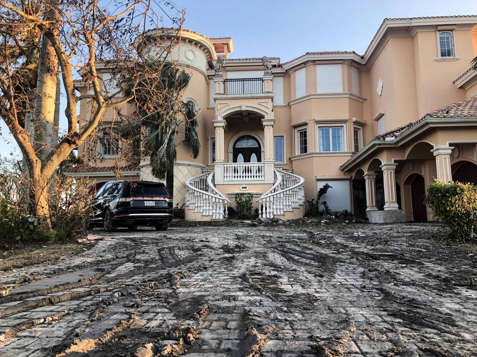 A house sits damaged 